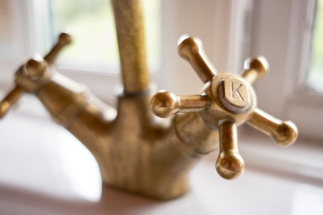 Unique and Intricately Designed Brass Faucet for a Modern Bathroom