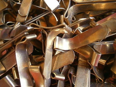 a pile of sheared copper strips