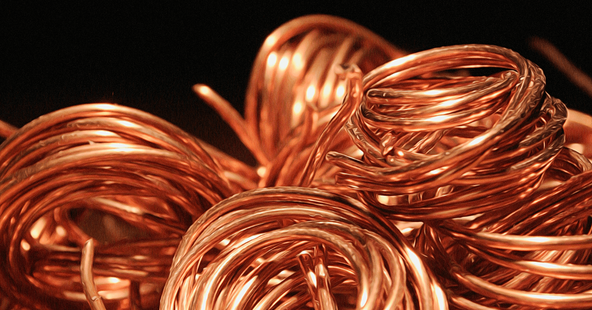 Rolls of copper with dark background