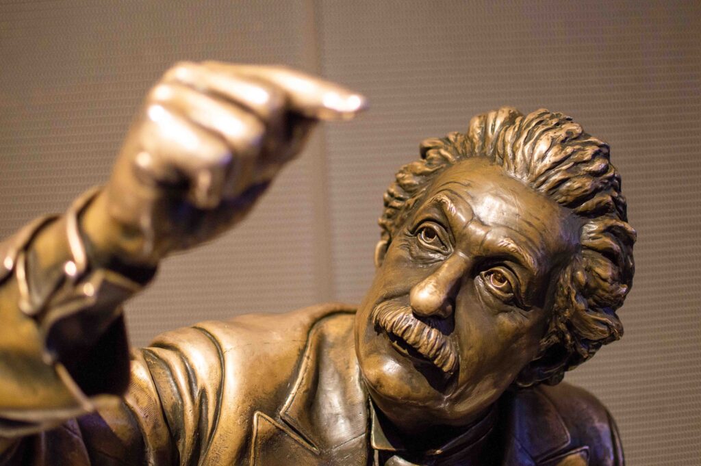 A modern bronze statue of Albert Einstein